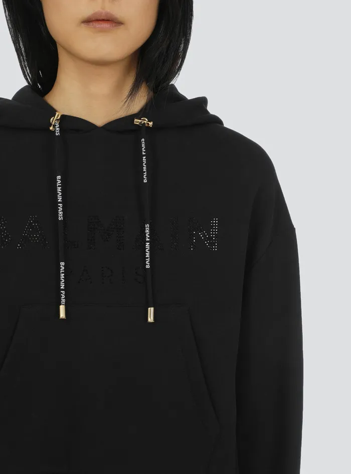 Balmain Sweatshirts Womens Cropped EcoDesigned Cotton Sweatshirt With Rhinestone Balmain Logo Black