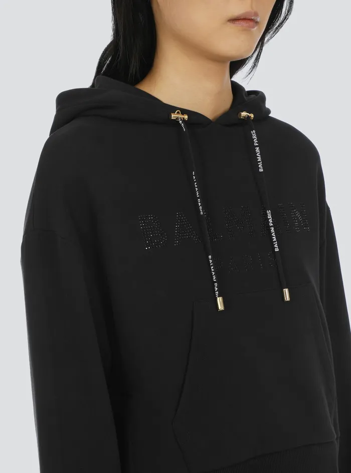 Balmain Sweatshirts Womens Cropped EcoDesigned Cotton Sweatshirt With Rhinestone Balmain Logo Black