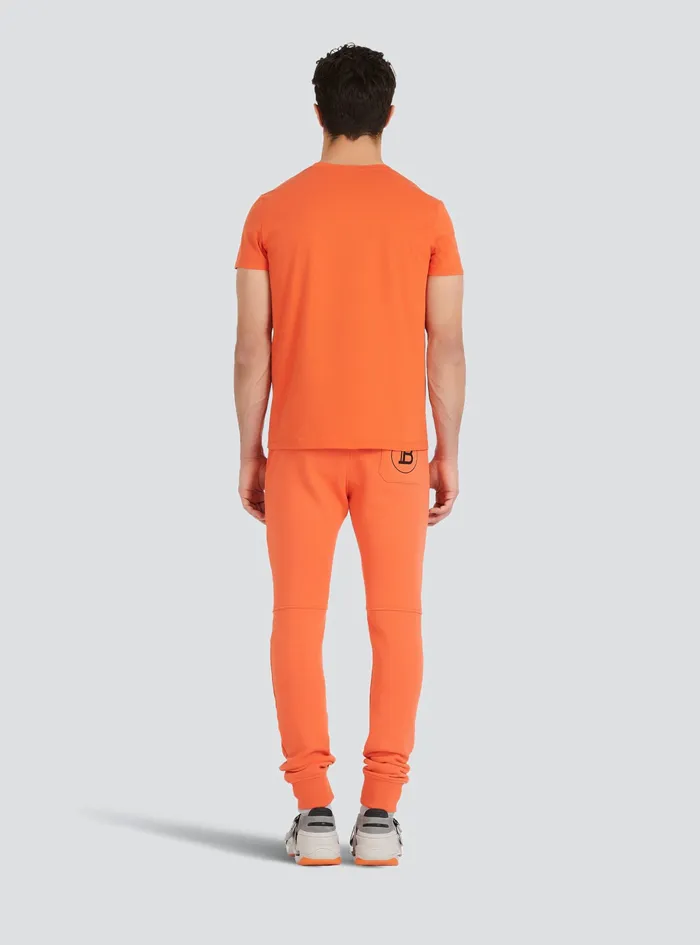 Balmain TShirts Mens EcoDesigned Cotton TShirt With Small Flocked Balmain Paris Logo Orange Balmain TShirts Mens EcoDesigned Cotton TShirt With Small Flocked Balmain Paris Logo Orange