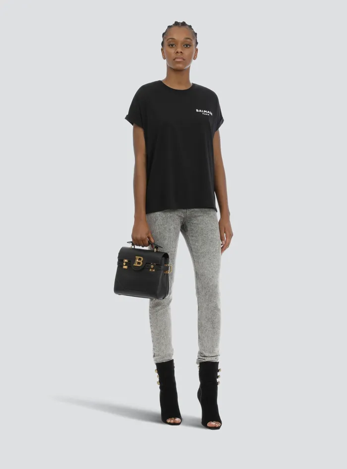 Balmain TShirts Womens EcoDesigned Cotton TShirt With Small Flocked Balmain Logo Black Balmain TShirts Womens EcoDesigned Cotton TShirt With Small Flocked Balmain Logo Black