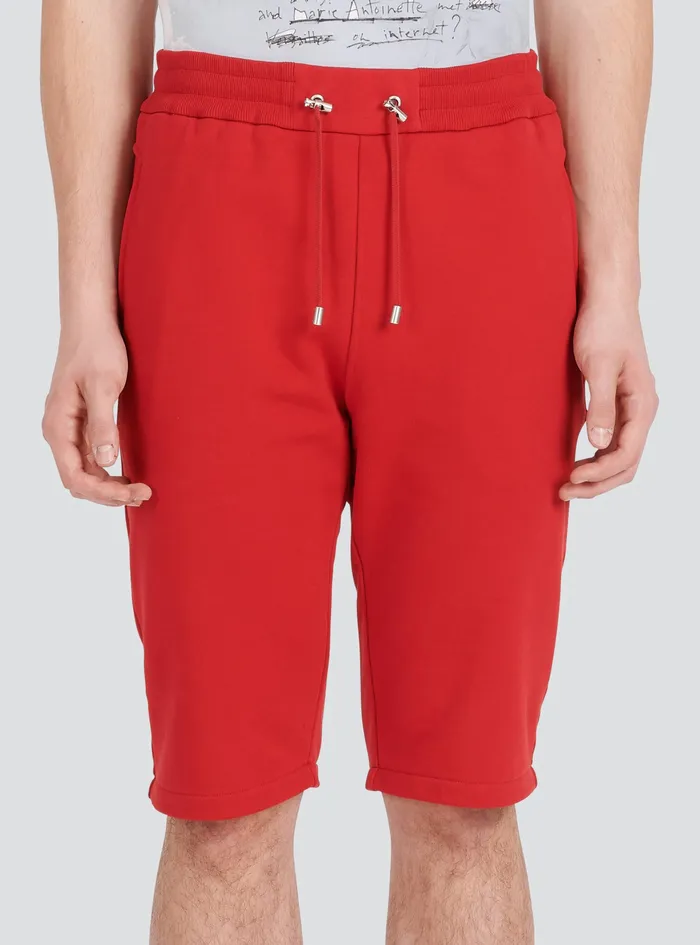Balmain Trousers And Shorts Mens Cotton Shorts With Flocked Balmain Paris Logo Red Balmain Trousers And Shorts Mens Cotton Shorts With Flocked Balmain Paris Logo Red