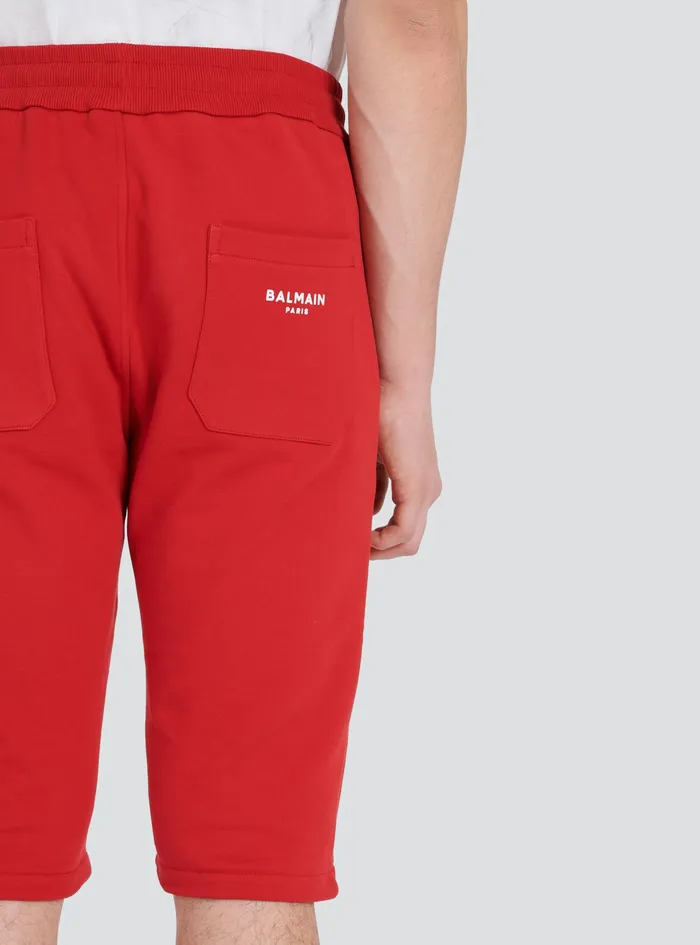 Balmain Trousers And Shorts Mens Cotton Shorts With Flocked Balmain Paris Logo Red Balmain Trousers And Shorts Mens Cotton Shorts With Flocked Balmain Paris Logo Red