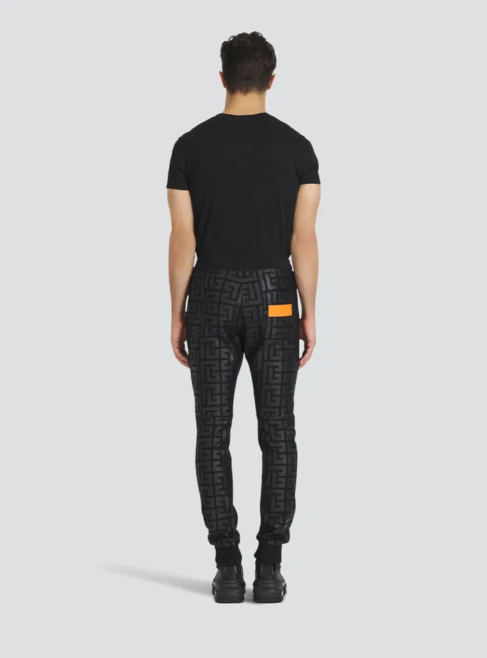 Balmain Trousers And Shorts Mens EcoDesigned Cotton Sweatpants With Maxi Balmain Monogram Black Balmain Trousers And Shorts Mens EcoDesigned Cotton Sweatpants With Maxi Balmain Monogram Black