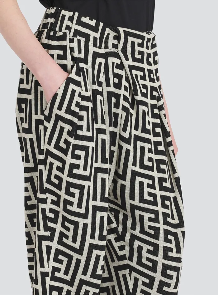 Balmain Trousers And Shorts Womens EcoDesigned Draped Pants With Balmain Print Monogram Black Balmain Trousers And Shorts Womens EcoDesigned Draped Pants With Balmain Print Monogram Black