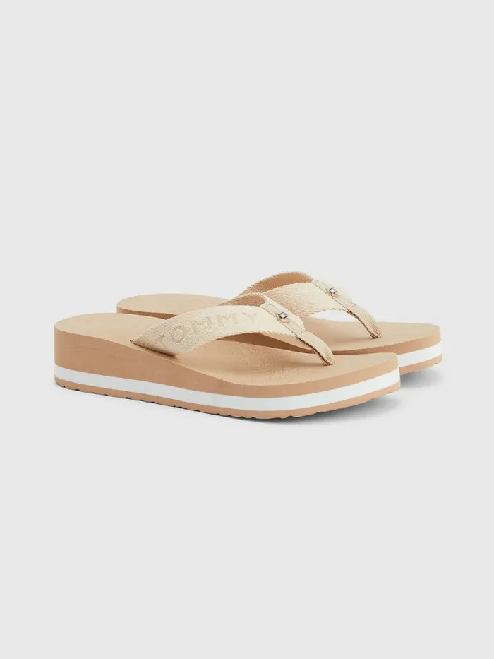 Tommy Hilfiger Sparkle Detail Monogram Print Wedge FlipFlops Sandrift Womens Pumps Casaul Tommy Hilfiger Sparkle Detail Monogram Print Wedge FlipFlops Sandrift Womens Pumps Casaul